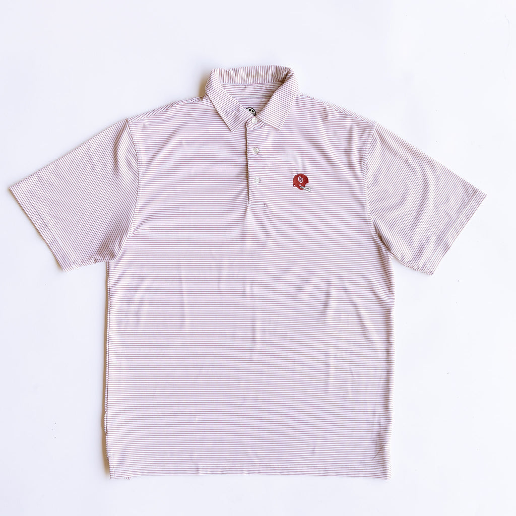 Flat lay of 1966 ou sooners helmet pinstripe gameday polo