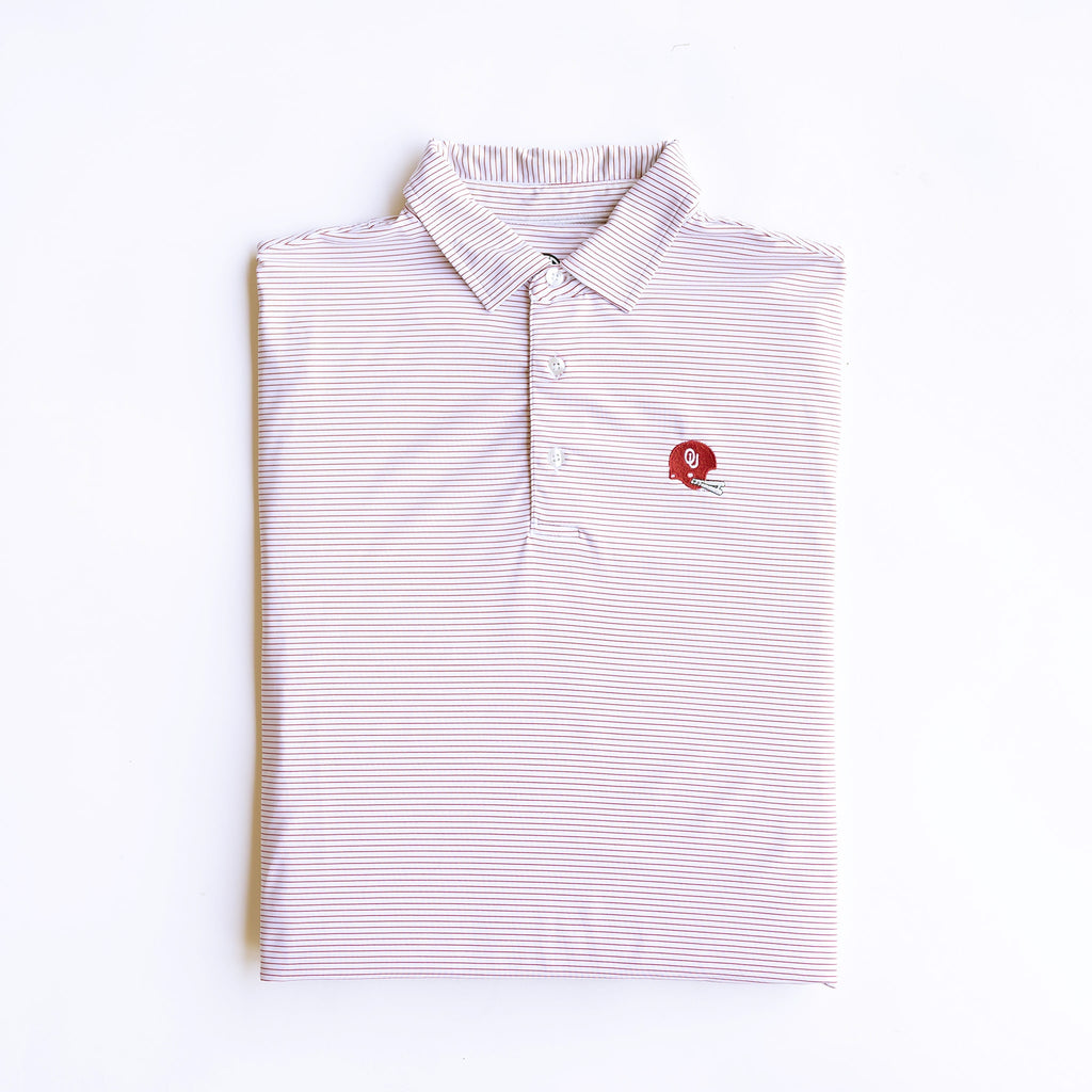 Folded flat lay of 1966 OU helmet pinstripe gameday polo